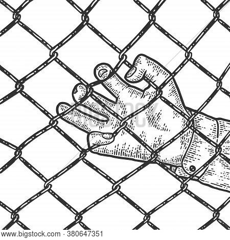 Close Up Of The Fingers Of A Man Hand On A Metal Fence