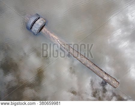 Log With Tires Floating In A Pond Top View Aerial Photo.