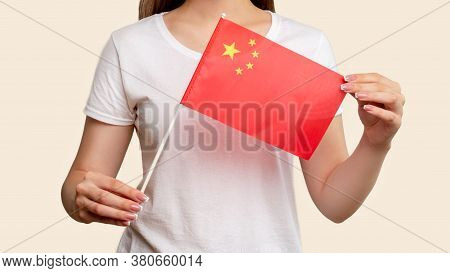 China Flag. Communism Society. Woman In White Holding Five-starred Red Official National Republic Sy