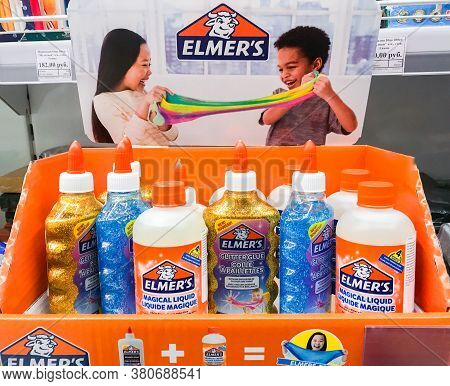 Moscow, Russia, December 2019: Close-up Of A Bottle With Golden Shiny Glue From Palmer's For Making 