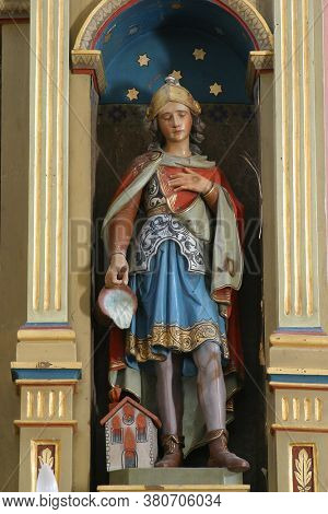 ROZGA, CROATIA - SEPTEMBER 15, 2012: Saint Florian statue on the altar of the Immaculate Heart of Mary in the Church of Saint Anne in Rozga, Croatia