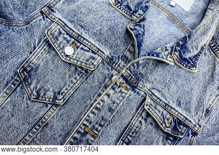 Close-up Photo Of Several Elements Of A Beautiful And Fashionable Denim Jacket.
