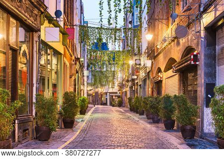 Brussels, Belgium quaint street scene at dawn.