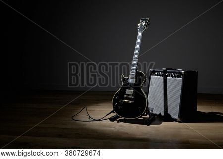 Photo of Electric guitar and amplifier