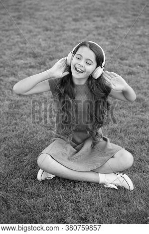 Practicing Her Singing. Happy Singer Sing Song Outdoors. Little Girl Enjoy Singing To Music. Vocal E