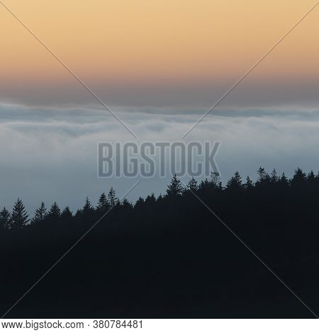 Majestic Landscape Image Of Cloud Inversion At Sunset Over Dartmoor National Park In Engand With Clo