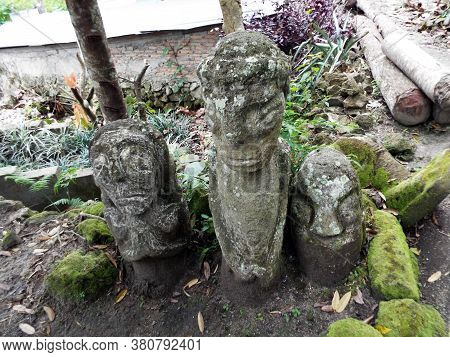 Pulau Samosir, Lake Toba, Sumatra, Indonesia, January 13, 2018: Stone Sculptures In An Ancient Megal