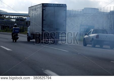 Salvador, Bahia / Brazil - August 21, 2018: Smoke Is Seen Coming From The Exhaust System Of A Truck 
