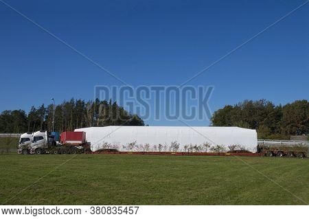 A Truck With A Special Semi-trailer For Transporting Oversized Loads. Oversize Load Or Exceptional C