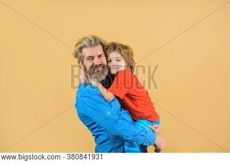 Family Time. Dad And Son. Good Relationships. Parentship Concept. Family Relationships. Dad Hugs Wit