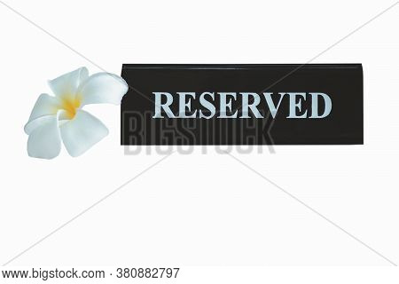 Reserved Metal Black Plate In A Restaurant. Reserved Metal Plate Isolated On White Background With C