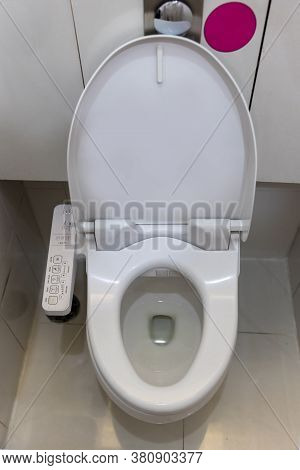 Electronic Control Panel Of Toilet Sanitary Ware With Automatic Flush System. Toilet With Electronic