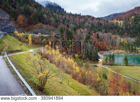 Alpine Isar River View From Sylvenstein Stausee Damm , Bavaria, Germany. Autumn Overcast, Foggy And 