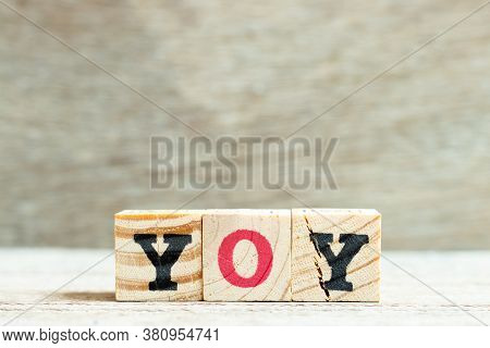 Alphabet Letter In Word Yoy (abbreviation Of Year Over Year) On Wood Background