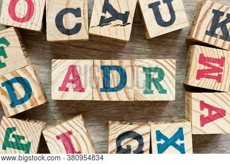 Alphabet Letter Block In Word Adr (abbreviation Of Adverse Drug Reaction) With Another On Wood Backg