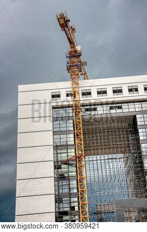 Crane on the site at the construction of a skyscraper
