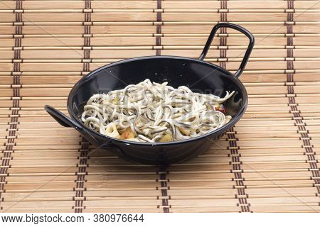 Sea Angulas With Garlic And Hot Chili Pepper, Typical Dish Of Northern Spain