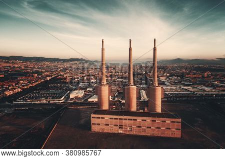Besos thermic power plant aerial view at sunrise in Barcelona coast Spain.