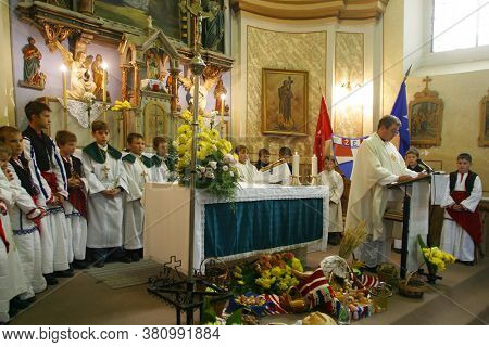 SOPJE, CROATIA - NOVEMBER 24, 2014: Mass on Thanksgiving day in Sopje, Croatia