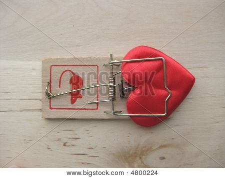 쥐 덫에 심장의 모양에 있는 기호