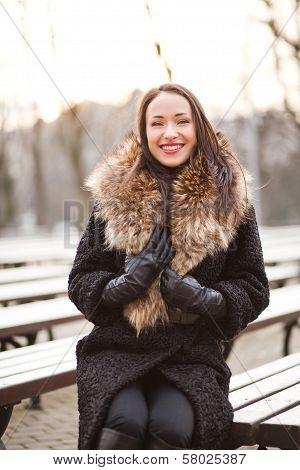 Business woman laughing in the park