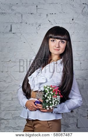 Girl With Bouquet Of Flowers