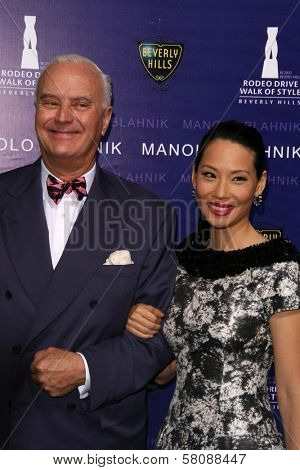 Manolo Blahnik and Lucy Liu   at the Rodeo Drive Walk of Style Award Gala. Rodeo Drive, Beverly Hills, CA. 09-25-08