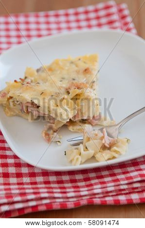 Creamy baked pasta with bacon and cheese
