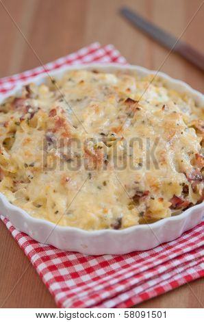 Creamy baked pasta with bacon and cheese