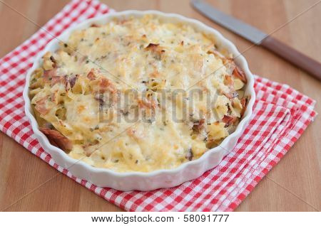 Creamy baked pasta with bacon and cheese