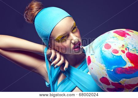 Grotesque. Eccentric Woman With Fancy Stagy Makeup And Air Balloon