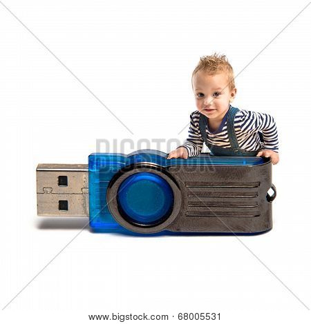 Kid On Pendrive Over White Background