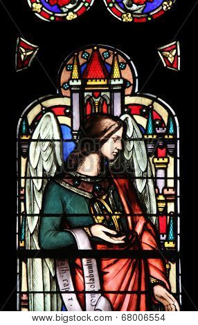 PARIS, FRANCE - NOV 11, 2012: Angel, stained glass from Church of St-Germain-l'Auxerr ois founded in the 7th century, was rebuilt many times over several centuries. 