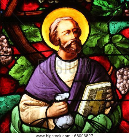 PARIS, FRANCE - NOV 11, 2012: Apostle, stained glass from Church of St-Germain-l'Auxerr ois founded in the 7th century, was rebuilt many times over several centuries. 