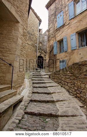Narrow Street In Medieval Town Gordes, Southern France