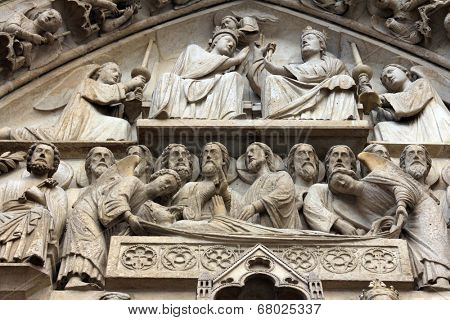 PARIS, FRANCE - NOV 05, 2012: architectural detail of Notre Dame cathedral. The Portal of the Virgin, dedicated to the patroness of the cathedral, was sculpted in the 1210s-1220s.