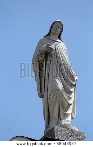 PARMA, ITALY - MAY 01,2014: Statue of saint, San Giovanni Evangelista is a church in Parma, northern Italy, part of a complex also including a Benedictine convent, Parma. Emilia-Romagna, May 01,2014. 