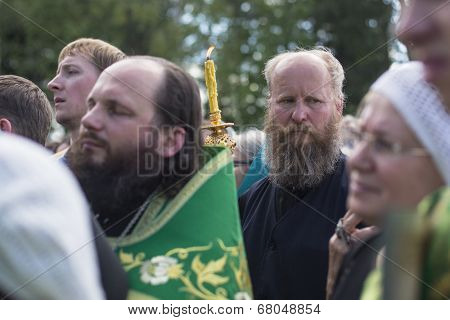 KRASNY BRONEVIK, RUSSIA - JULY 7, 2014: Celebrations commemorating the Rev. Anthony Dymsky (died 1224) in Antony Dymsky Monastery - Procession on Lake Dymsky, the great blessing of water and bathing.