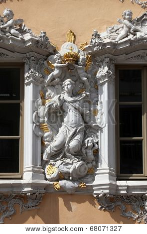 WURZBURG, GERMANY - JULY 18: Virgin Mary, House of Falcon, the finest Rococo style building in the city. Erected in the 18th century reconstructed in the 1950s, on July 18, 2013 in Wurzburg, Germany