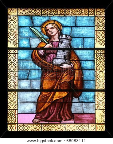 PORT AZZURRO, ELBA, ITALY - MAY 03: Saint Barbara, stained glass in the church of St. James the Greater. The church is located inside the fort of the same name in Porto Azzurro, Italy on May 4, 2014