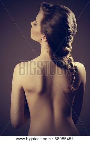 Girl With Naked Back And Hair-style