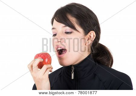 closeup portratit beautiful young girl holding a red apple