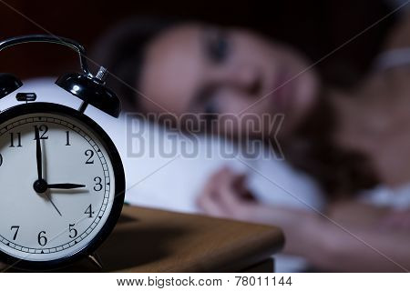 Alarm Clock On Night Table
