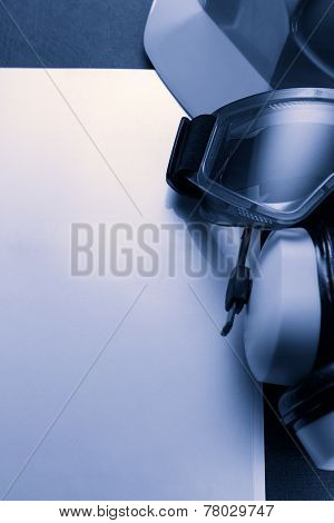 Blank Sheet With Helmet, Goggles And Headphones
