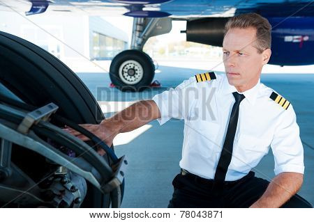 Checking The Wheels.