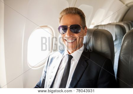 Businessman In Airplane.