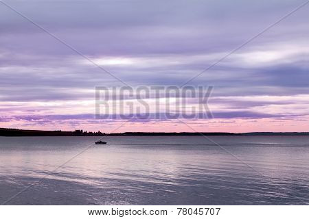Lonely Motor Boat Floats On Kama Big River In Summer Evening