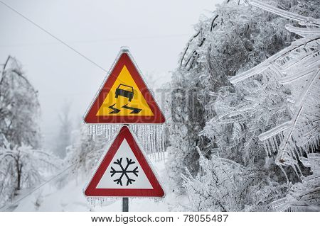 Dangerous And Icy Road With Sleet Covered Trees