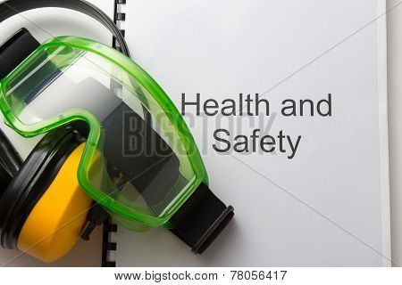 Health And Safety Register With Goggles And Earphones