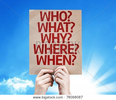 Who? What? Why? Where? When? card on sky background